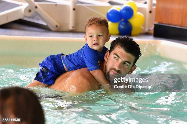 Boomer Phelps and Michael Phelps attend the Huggies Little Swimmers #trainingfor2032 Swim Class With The Phelps Foundation on August 21, 2017 in New...