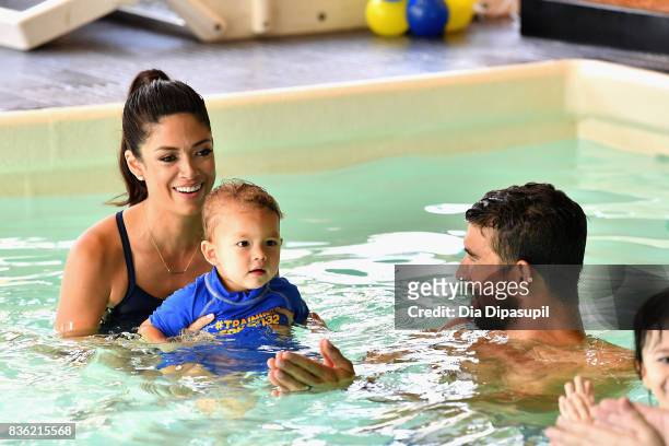 Nicole phelps, Boomer Phelps and Michael Phelps attend the Huggies Little Swimmers #trainingfor2032 Swim Class With The Phelps Foundation on August...