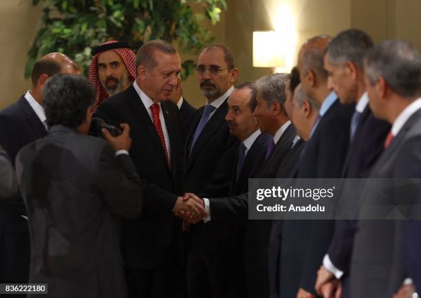 President of Turkey, Recep Tayyip Erdogan attends an inter-delegational meeting after meeting with Abdullah II of Jordan at Raghadan Palace in Amman,...