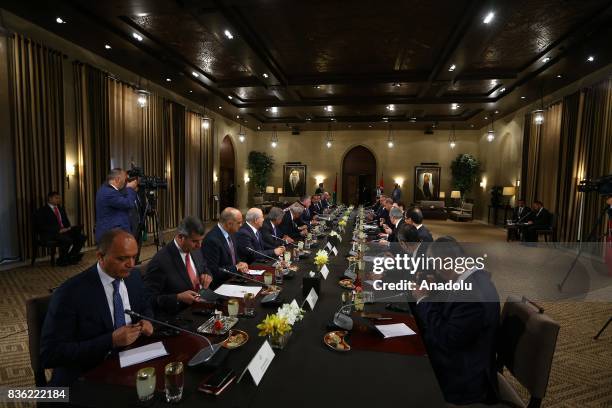 President of Turkey, Recep Tayyip Erdogan attends an inter-delegational meeting after meeting with Abdullah II of Jordan at Raghadan Palace in Amman,...