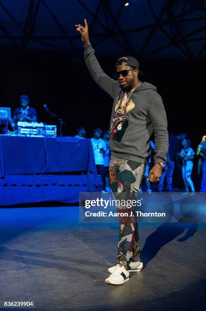 Gucci Mane performs on stage at Chene Park on August 20, 2017 in Detroit, Michigan.