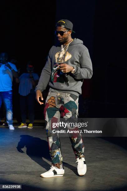 Gucci Mane performs on stage at Chene Park on August 20, 2017 in Detroit, Michigan.