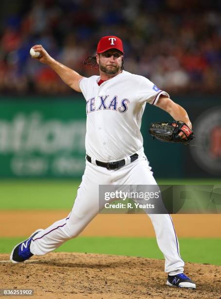 Jason Grilli of the Texas Rangers throws in the seventh inning against the Chicago White Sox at Globe Life Park in Arlington on August 19, 2017 in...