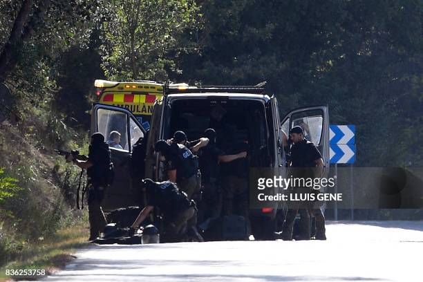 Members of TEDAX-NRBQ on the site where Moroccan suspect Younes Abouyaaqoub was shot on August 21, 2017 near Sant Sadurni d'Anoia, south of...