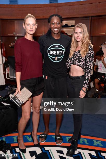 Patricia Van Der Vliet and Chelsey Weimar pose with Tina Charles of the New York Liberty after the game against the Minnesota Lynx on August 20, 2017...