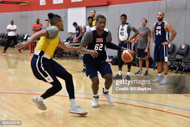 Jonathan Holmes of the USA AmeriCup Team dribbles the ball during a training camp at the University of Houston in Houston, Texas on August 18, 2017....