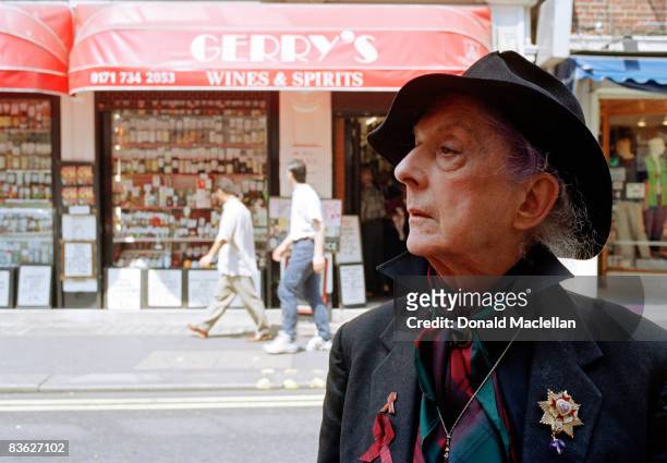 English writer, actor, artist's model and gay icon Quentin Crisp , Old Compton Street, London, 26th June 1996. Gerry's off license is across the road.