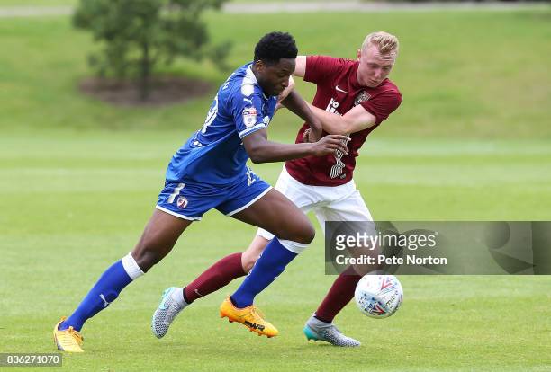 Ricky German of Chesterfield contests the ball with Jarvis Wilson of Northampton Town during the Reserve Match between Northampton Town and...