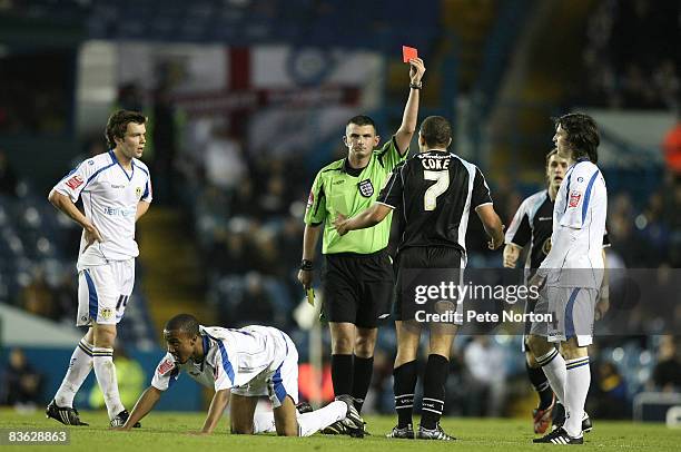 Giles Coke of Northampton Town is shown a red card by referee Michael Oliver during the F.A Cup ,sponsored by e.on, First Round Match between Leeds...