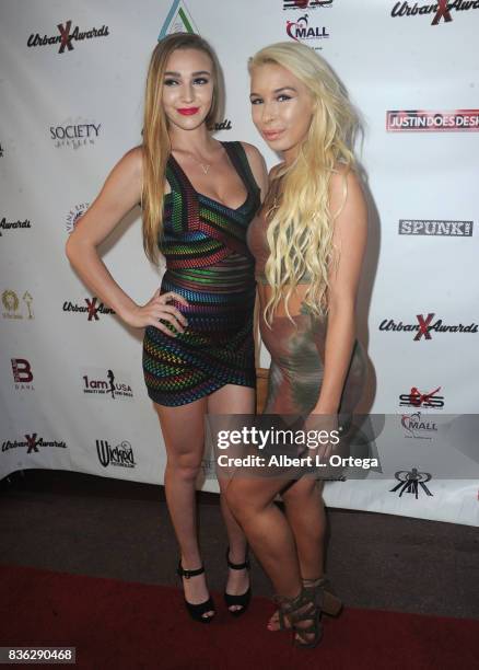 Actresses Kendra Sunderland and Carmen Caliente arrive for the 6th Urban X Awards held at Stars On Brand on August 20, 2017 in Glendale, California.