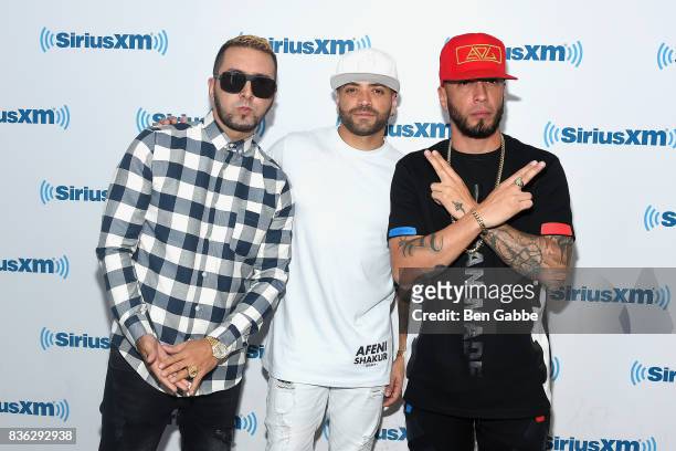 Reggaeton duo Fido and Alexis of 'Alexis Y Fido' with singer Nacho at SiriusXM Studios on August 21, 2017 in New York City.