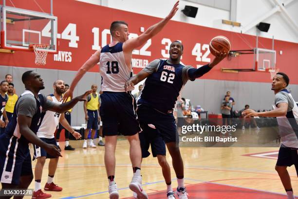 Jonathan Holmes of the USA AmeriCup Team drives to the basket during a training camp at the University of Houston in Houston, Texas on August 19,...