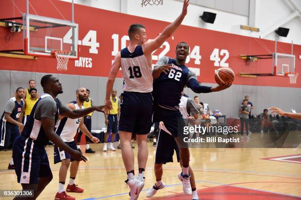 Jonathan Holmes of the USA AmeriCup Team drives to the basket during a training camp at the University of Houston in Houston, Texas on August 19,...