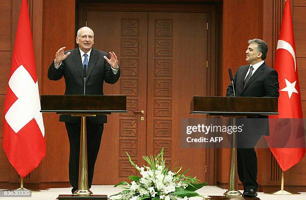 President of Switzerland Pascal Couchepin and his Turkish counterpart Abdullah Gul speak to the media during a news conference at the Cankaya Palace...