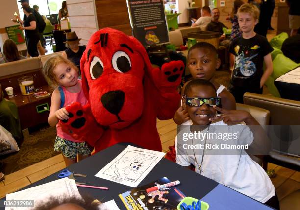 Holiday Inn hosts an Eclipse viewing party with Scholastic as part of the culmination event to the "Summer of Smiles" program on August 21, 2017 in...