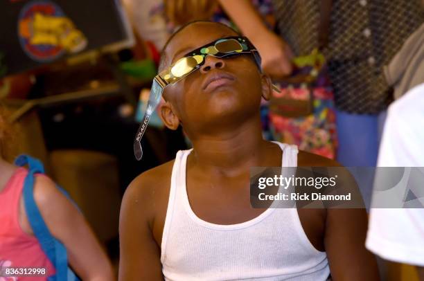 Holiday Inn hosts an Eclipse viewing party with Scholastic as part of the culmination event to the "Summer of Smiles" program on August 21, 2017 in...