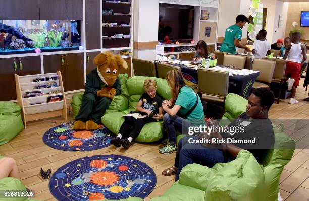 Holiday Inn hosts an Eclipse viewing party with Scholastic as part of the culmination event to the "Summer of Smiles" program on August 21, 2017 in...