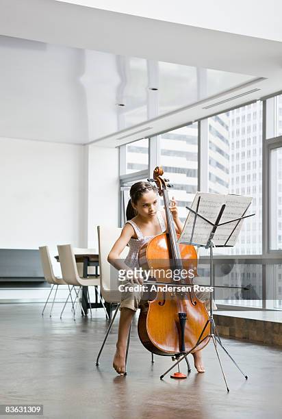 girl practicing her cello - cello - fotografias e filmes do acervo