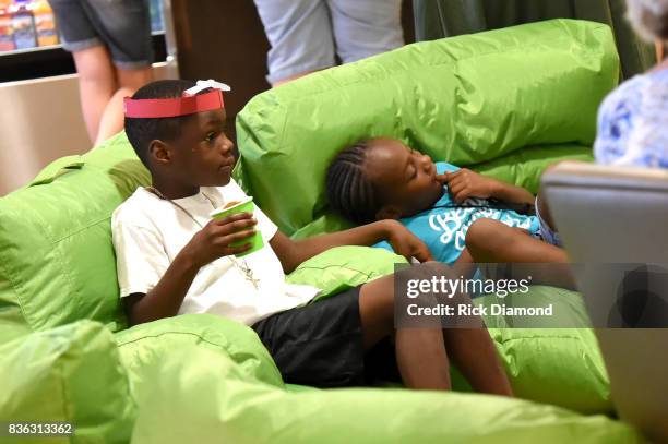 Holiday Inn hosts an Eclipse viewing party with Scholastic as part of the culmination event to the "Summer of Smiles" program on August 21, 2017 in...