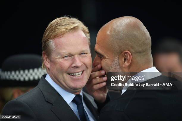 Ronald Koeman head coach / manager of Everton and Pep Guardiola the head coach / manager of Manchester Cityduring the Premier League match between...