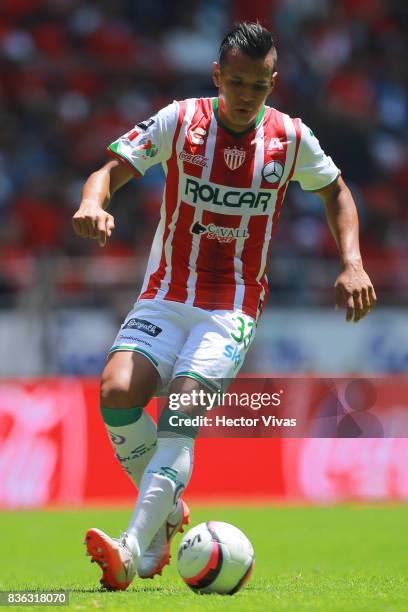 Mario de Luna of Necaxa drives the ball during the fifth round match between Toluca and Necaxa as part of the Torneo Apertura 2017 Liga MX at Nemesio...