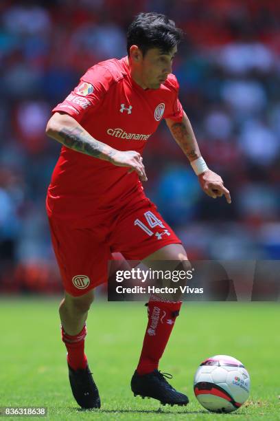 Rubens Sambueza of Toluca drives the ball during the fifth round match between Toluca and Necaxa as part of the Torneo Apertura 2017 Liga MX at...