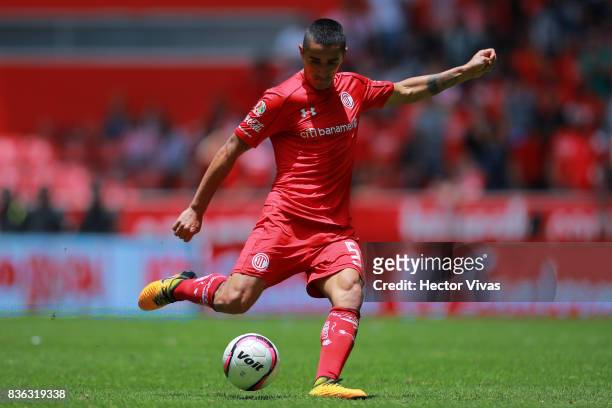 Osvaldo Gonzalez of Toluca kicks the ball during the fifth round match between Toluca and Necaxa as part of the Torneo Apertura 2017 Liga MX at...