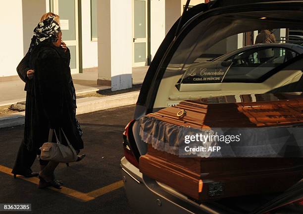 Lumumba , the personal assistant to Miriam Makeba, cries as she passes near the empty coffin of the international singer star on November 10, 2008 at...