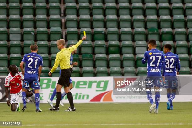 Jonathan Morsay of GIF Sundsvall is shown a yellow card during the Allsvenskan match between GIF Sundsvall and Kalmar FF at Idrottsparken on August...