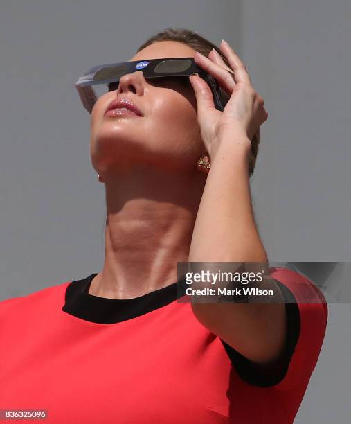 Ivanka Trump wears special glasses to view the solar eclipse at the White House on August 21, 2017 in Washington, DC. Millions of people have flocked...