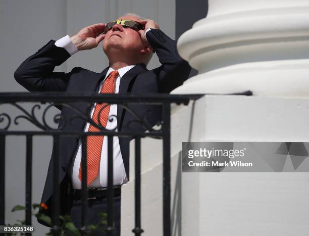Attorney General Jeff Sessions wears special glasses to view the solar eclipse at the White House on August 21, 2017 in Washington, DC. Millions of...
