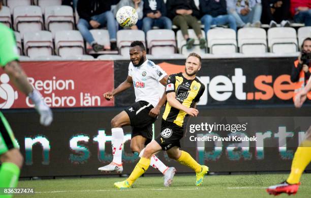 Michael Omoh of Orebro SK & Birkir Mar Saevarsson of Hammarby IF during the Allsvenskan match between Orebro SK and Hammarby IF at Behrn Arena on...