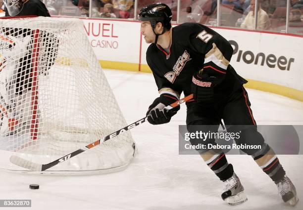 Steve Montador of the Anaheim Ducks moves the puck behind the net against the Florida Panthers during the game on November 9, 2008 at Honda Center in...