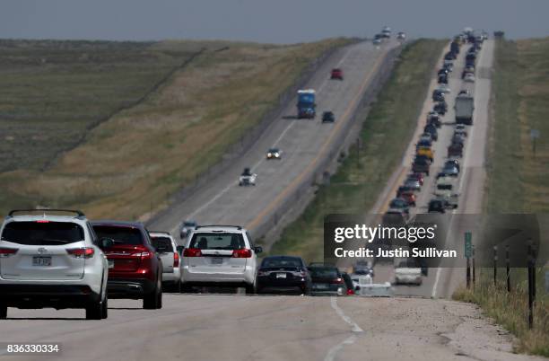 Traffic backs up on Highway 25 leaving Casper on August 21, 2017 in Douglas, Wyoming. Millions of people have flocked to areas of the U.S. That are...