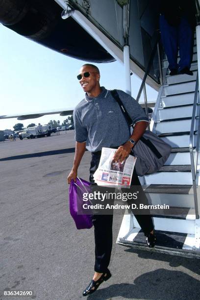 Byron Scott of the Los Angeles Lakers gets off the team plane on October 18, 1996 in Inglewood, California. NOTE TO USER: User expressly acknowledges...
