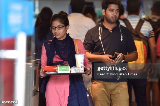 People eating at McDonald's outlet at Connaught Place on August 21, 2017 in New Delhi, India. McDonald's snapped its franchise agreement with...