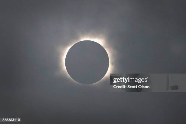 The moon eclipses the sun above the campus of Southern Illinois University on August 21, 2017 in Carbondale, Illinois. Although much of it was...