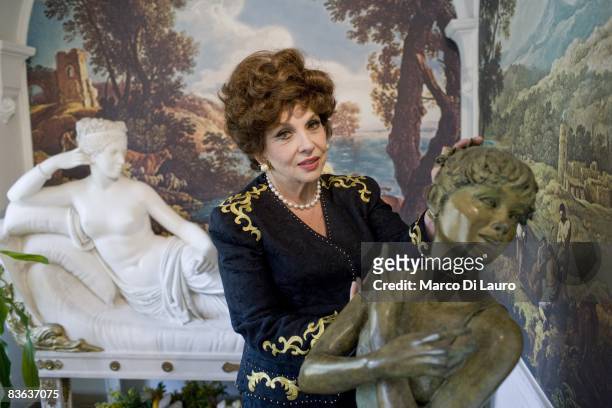 Italian actress Gina Lollobrigida is seen in her house next to her sculpture on October 14, 2008 in Rome, Italy.