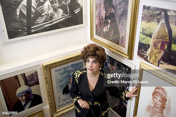 Italian actress Gina Lollobrigida is seen in her house next to her photographs and her drawings on October 14, 2008 in Rome, Italy.
