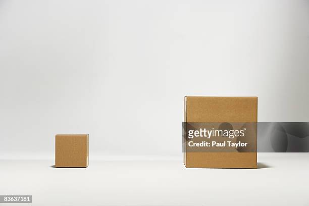 boxes - brown box stock pictures, royalty-free photos & images