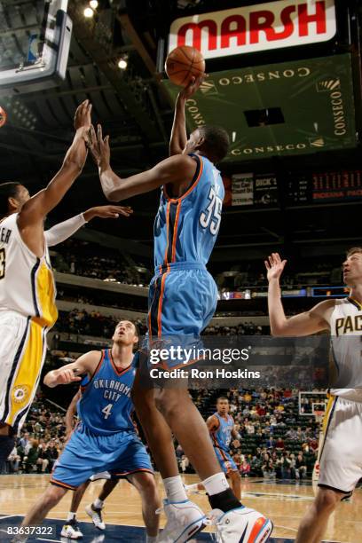 Kevin Durant of the Oklahoma City Thunder shoots over Danny Granger of the Indiana Pacers at Conseco Fieldhouse on November 10, 2008 in Indianapolis,...