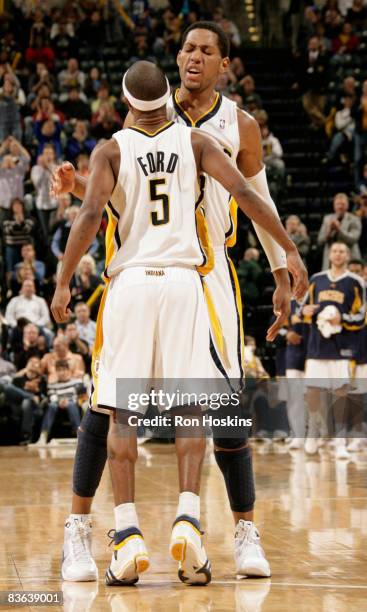 Danny Granger of the Indiana Pacers reacts to a shot made by T.J. Ford of the Pacers as the Pacers defeated the Oklahoma City Thunder 107-99 at...