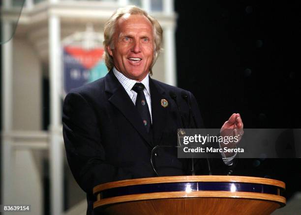 Greg Norman introduces legendary golf course designer Pete Dye at the World Golf Hall of Fame on November 10, 2008 during induction ceremonies in St....