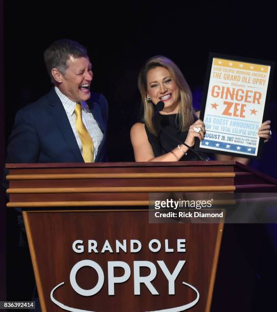 Opry host WSM's Bill Cody with Guest host Ginger Zee during Grand Ole Opry Total Eclipse 2017 Special Sunday Night Show at Grand Ole Opry House on...