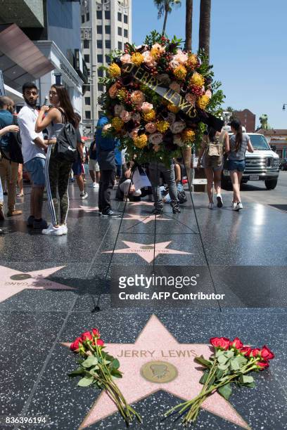 Flowers placed on the Hollywood Walk of Fame Star of comedian Jerry Lewis on August 21 in Hollywood, California. Lewis, who died on August 20 aged...