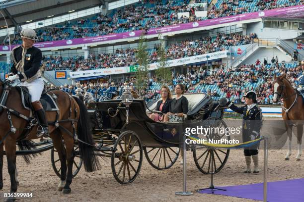 Princess Madeleine of Sweden and FEI General Secretary Sabrina Ibanez ride into Ullevi stadium in Gothenburg Sweden as part of the opening ceremony...