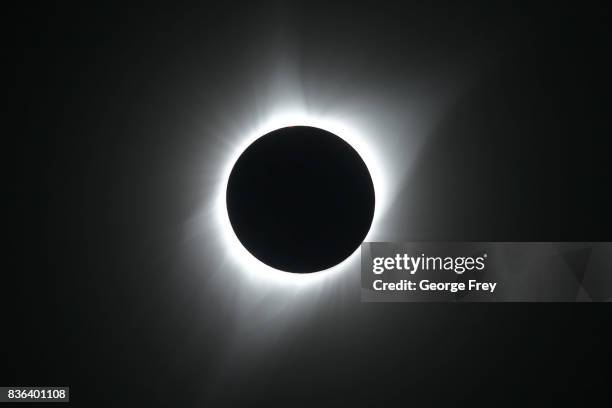 The sun is in full eclipse over Grand Teton National Park on August 21, 2017 outside Jackson, Wyoming. Thousands of people have flocked to the...