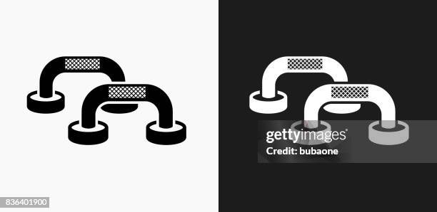 pushup workout icon on black and white vector backgrounds - push ups stock illustrations