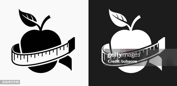 apple icon on black and white vector backgrounds - apple black background stock illustrations