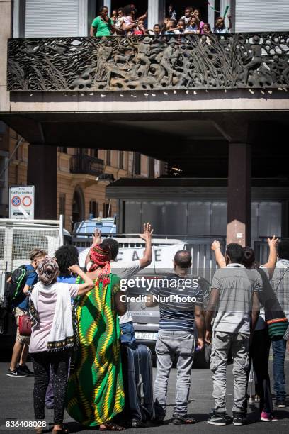 Evicted refugee with his personal items recovered from the vacated palace , in Piazza Indipedenza , by the police . The police let enter the palace 4...